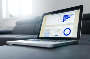 Data analytics dashboard on laptop showing enterprise SEO audit metrics