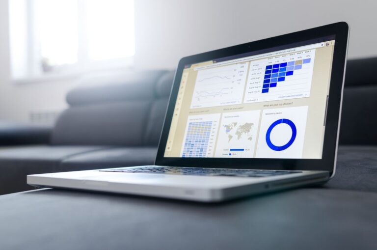 Technical SEO services: laptop displaying website analytics dashboard showing crawl errors, site speed metrics, and search performance data Rank Ray